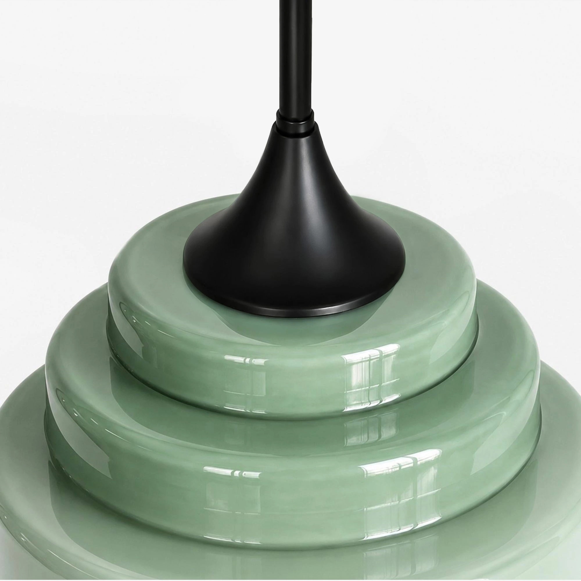 Dosel negro y detalle superior de la lámpara colgante Sanenos verde.