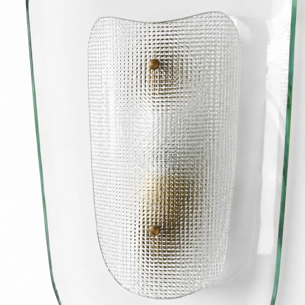 Front detail of clear glass wall sconce with textured inner shade