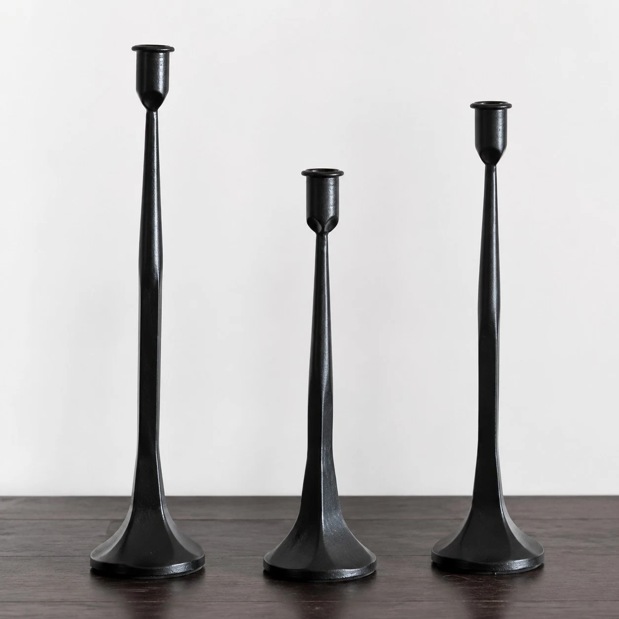 Three piece black iron candle holder set without candles