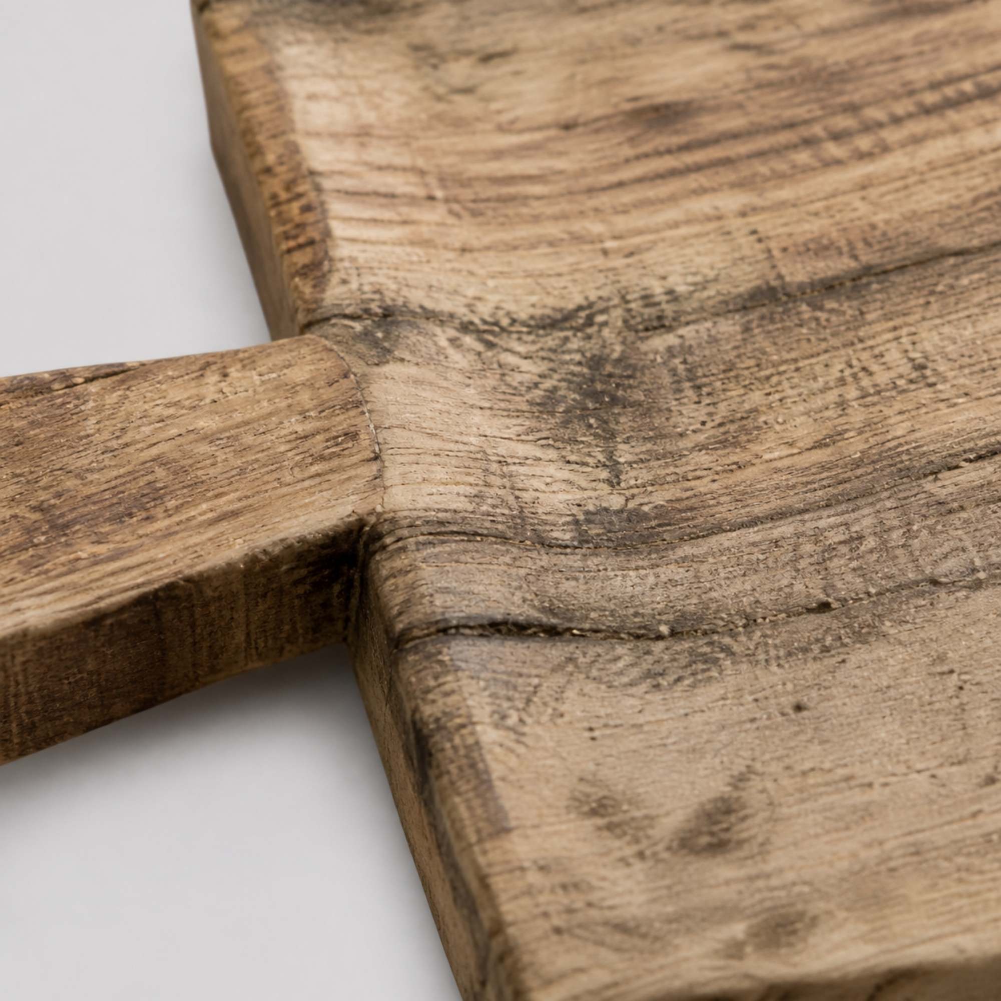 Close detail of reclaimed wood tray rim and handle
