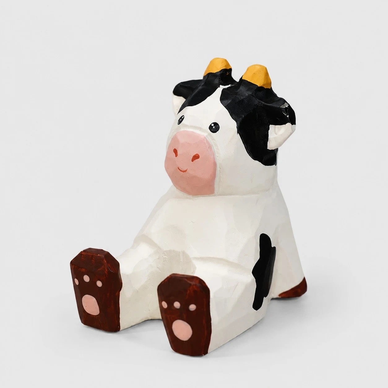 Hand-carved wooden animal phone stand