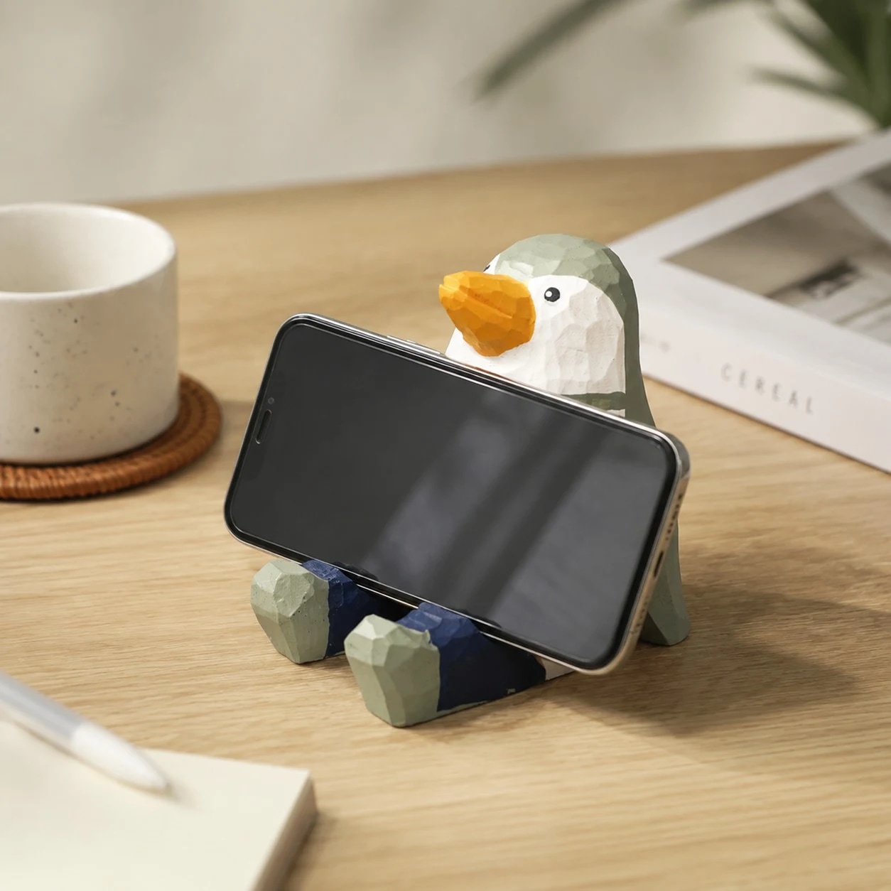 Wooden animal phone stand scene view