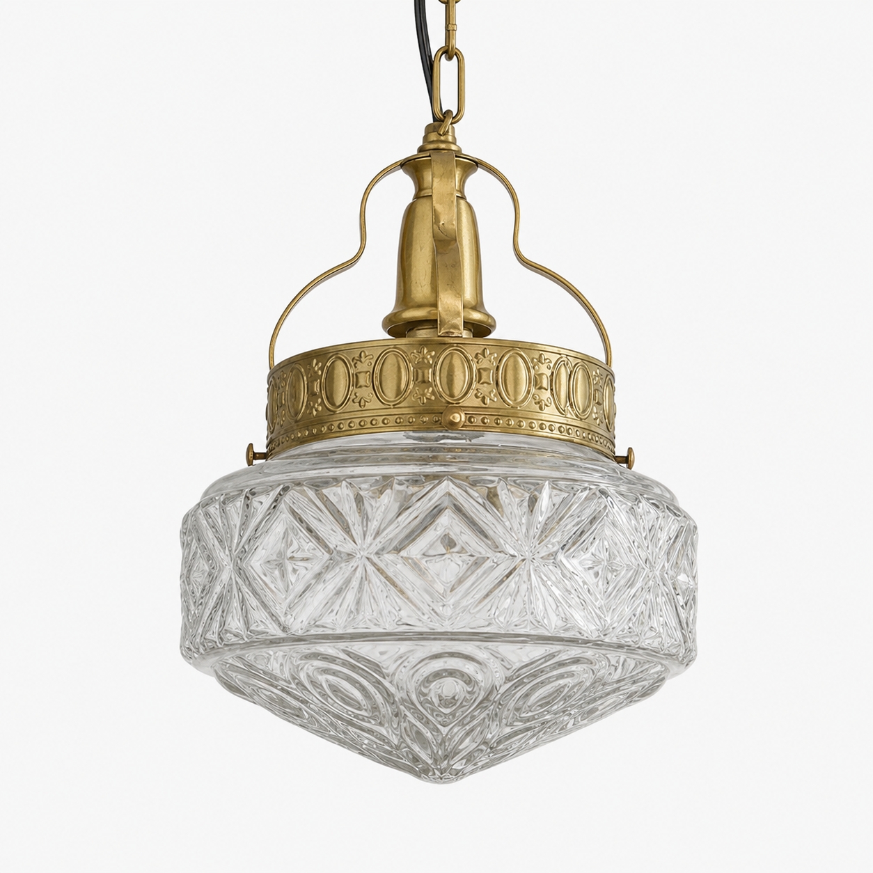 Clear embossed glass pendant light with brass hardware