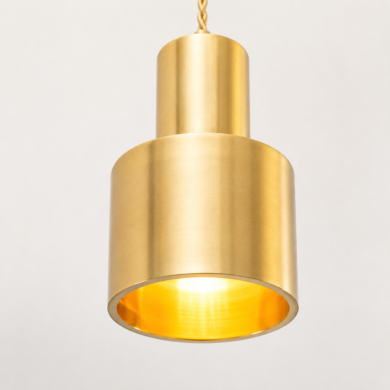 Close view of the brass shade and warm inner rim