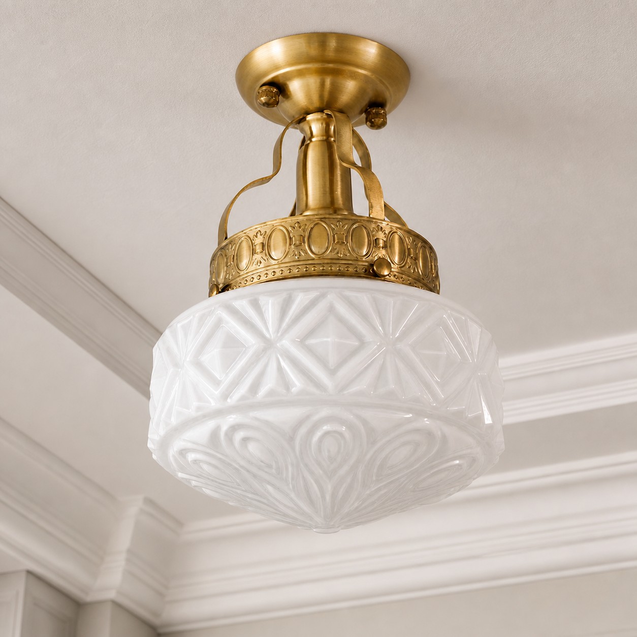 Cream White embossed glass ceiling light against decorative molding