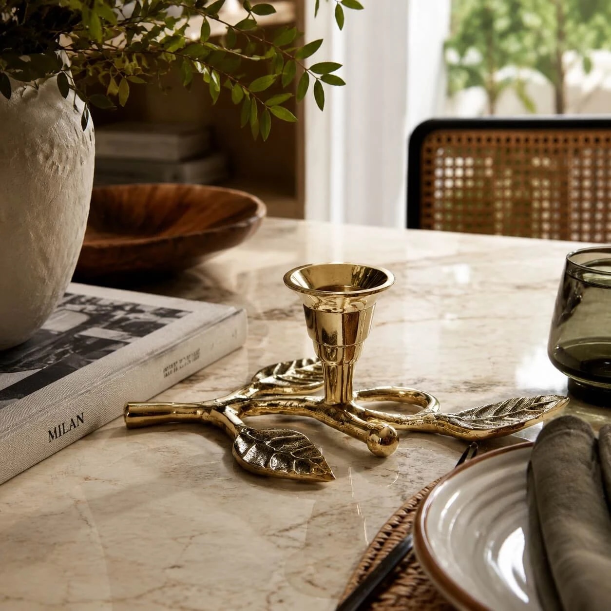 Branch candlestick dining scene