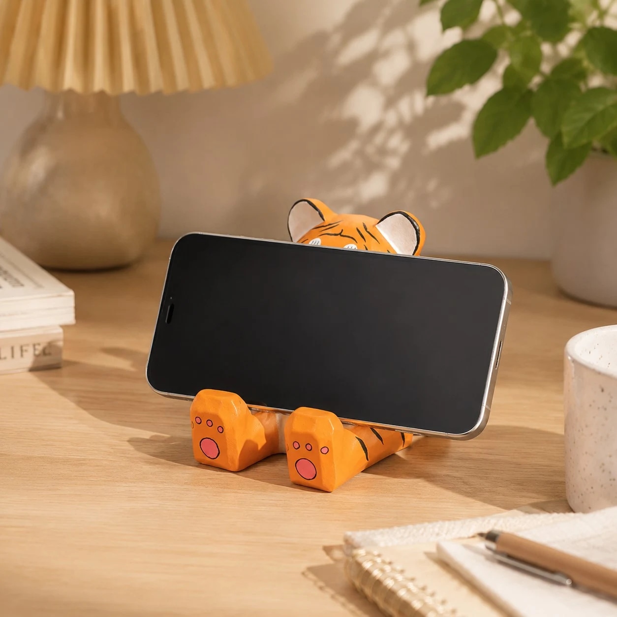Wooden animal phone stand scene view