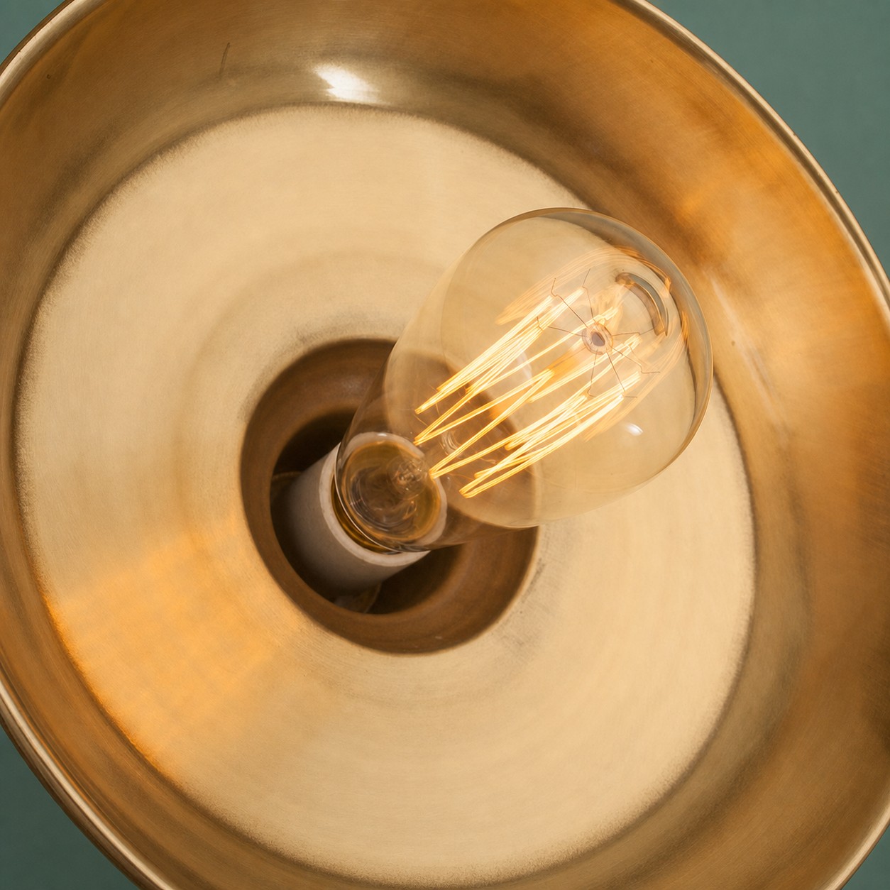 Brass pendant light socket and inner shade detail
