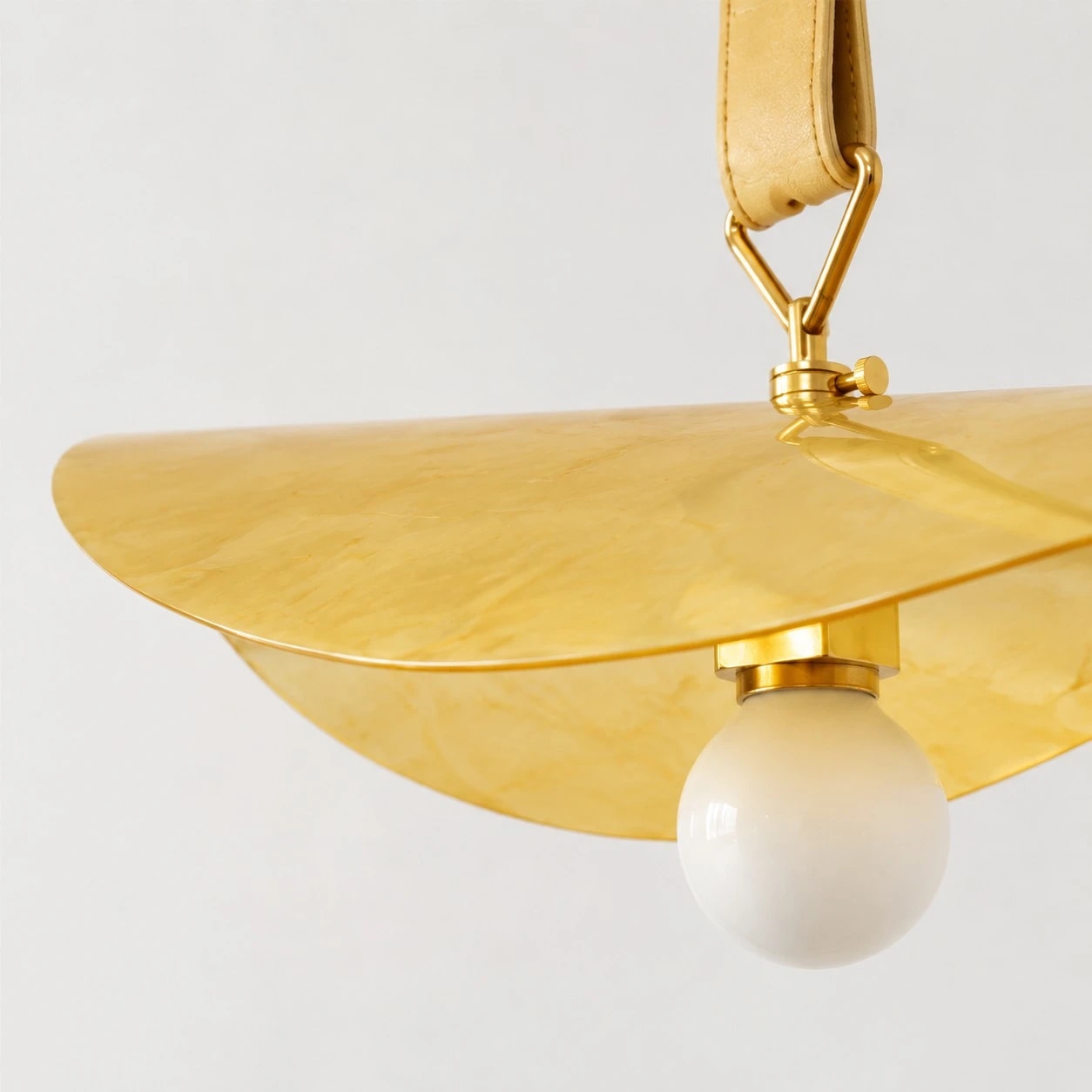Curved brass shade edge and E27 lamp holder detail
