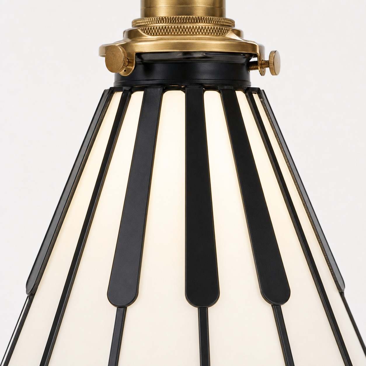 Black piano key frame around the glass shade