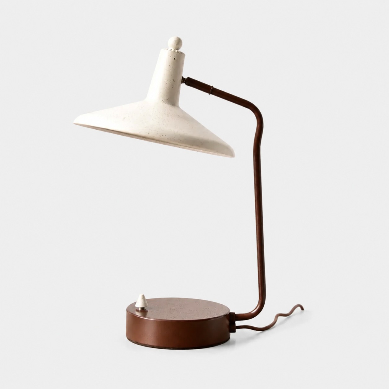 Front view of Japanese iron desk lamp with ivory shade and brown frame